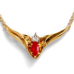 Exceptional styling. 10K yellow gold necklace has a single 8x4mm marquise lab-created ruby in a 6-prong setting with 1 round diamond and is on a 10K yellow gold rope chain which is 16.0 inches in length with a claw clasp. Ruby is July's birthstone.  