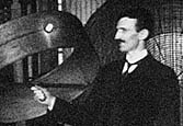 Tesla demonstrates 'wireless' power transmission in his Houston Street laboratory, 1899