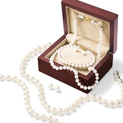 Simply graceful. Classic white cultured pearl set includes a necklace strand, a pair of cultured pearl stud earrings and a bracelet presented in a wooden box.  